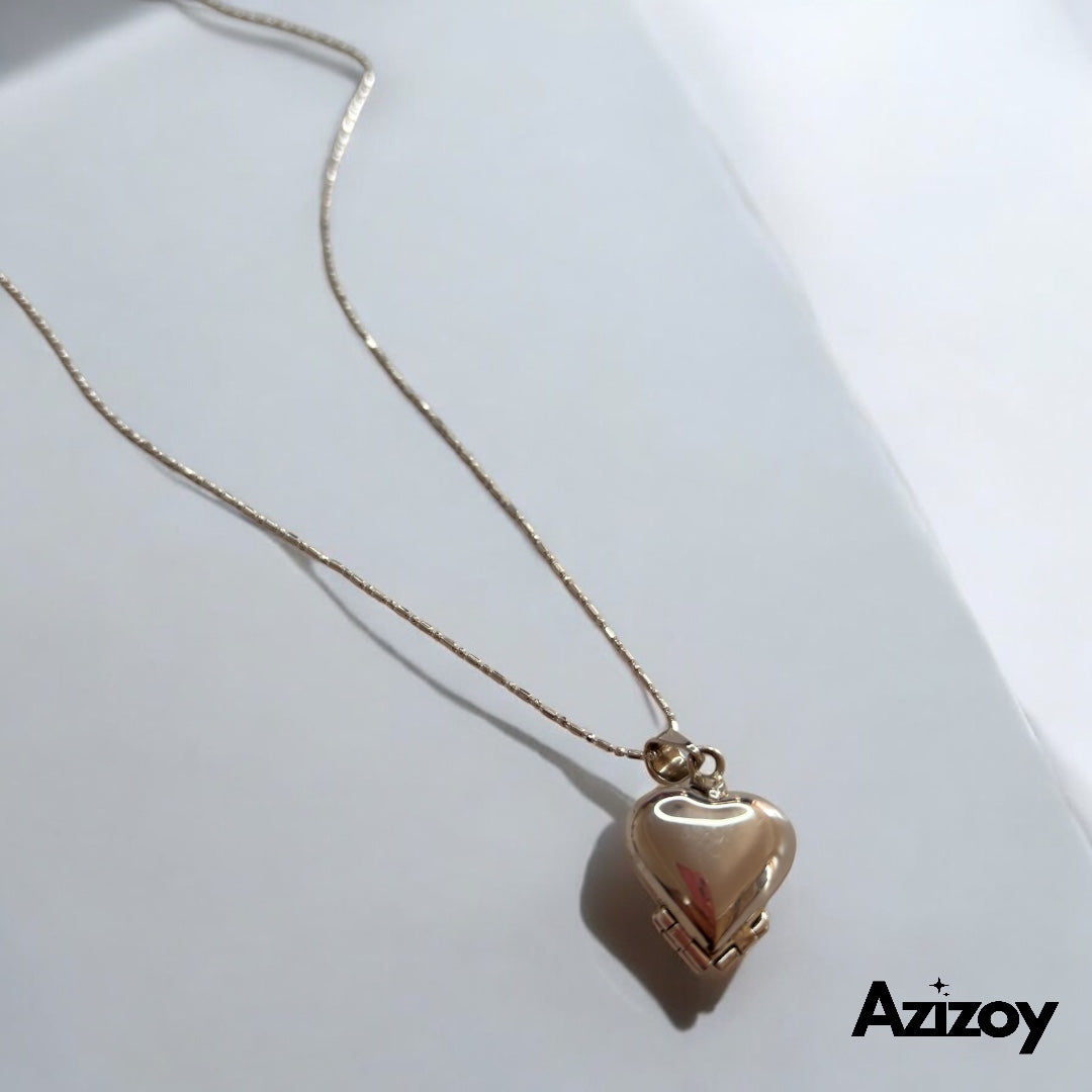 Corazón en Plata para 4 fotografías.