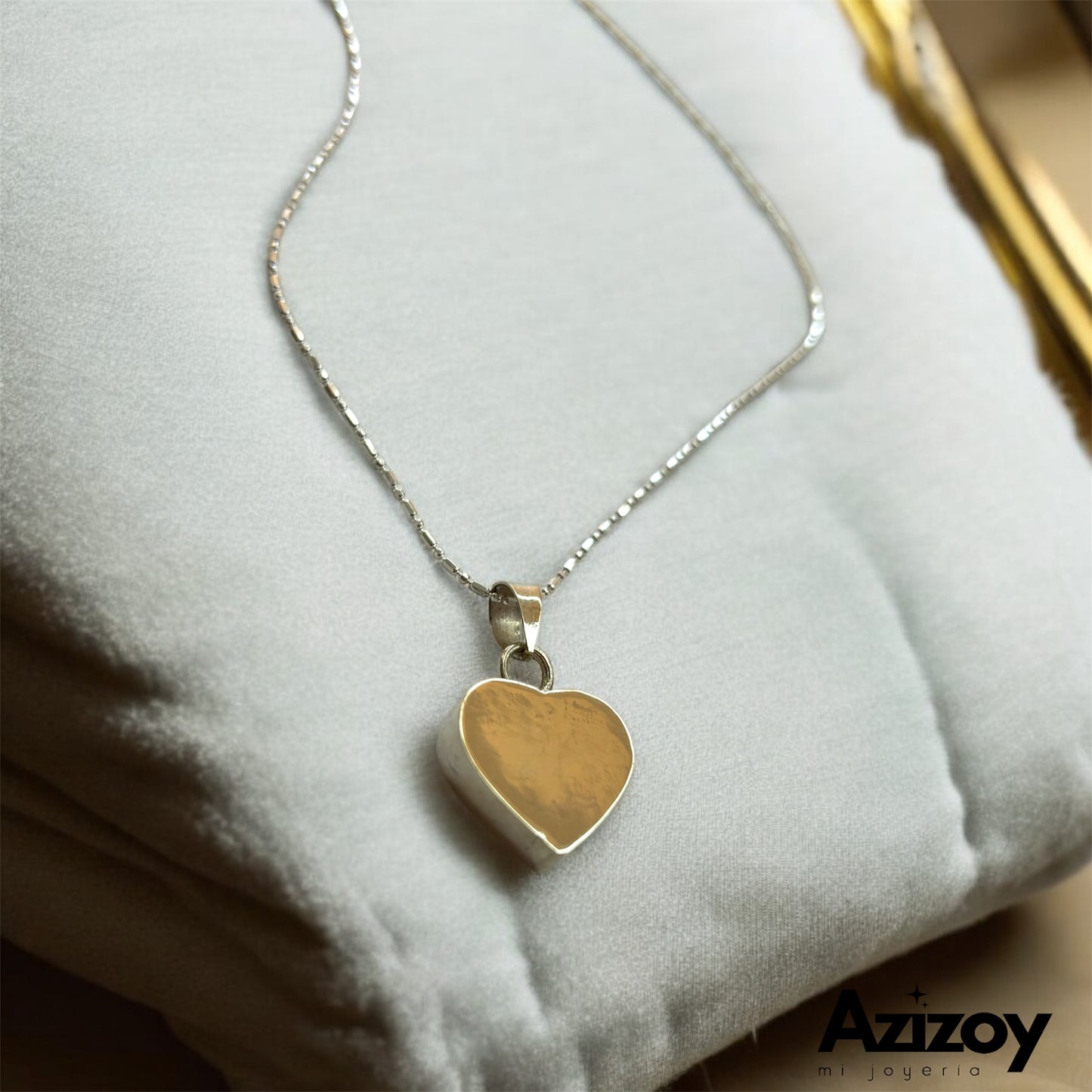 Dije de Corazón con cadena.